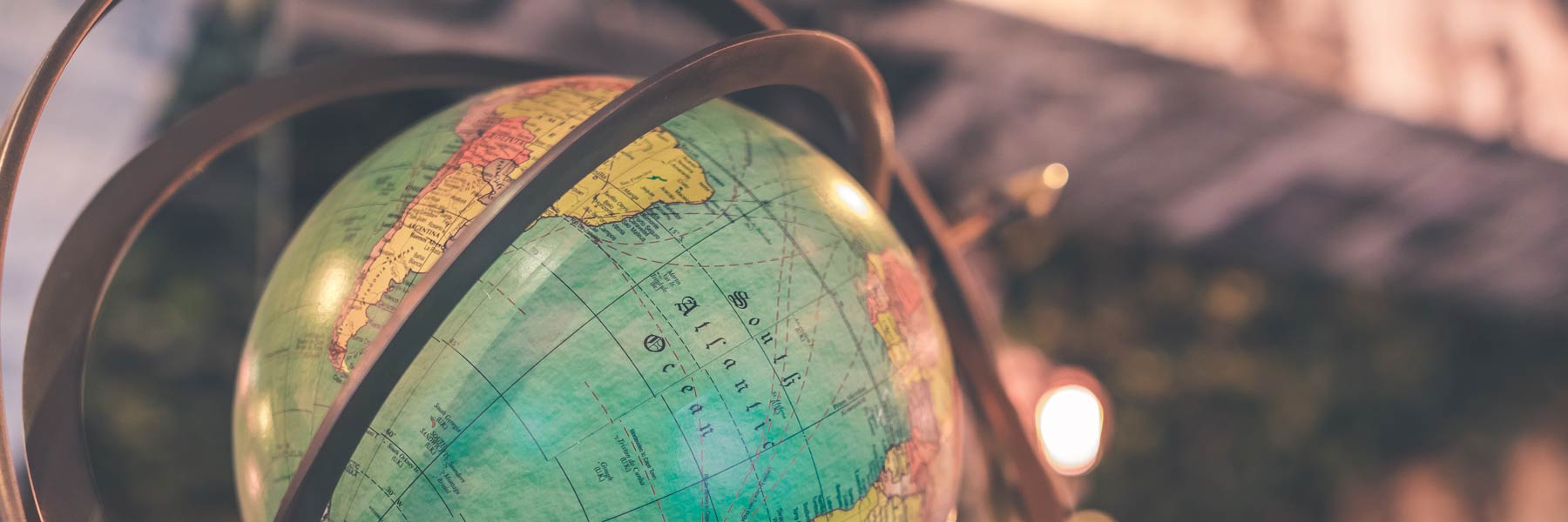 Globe with brass stand.